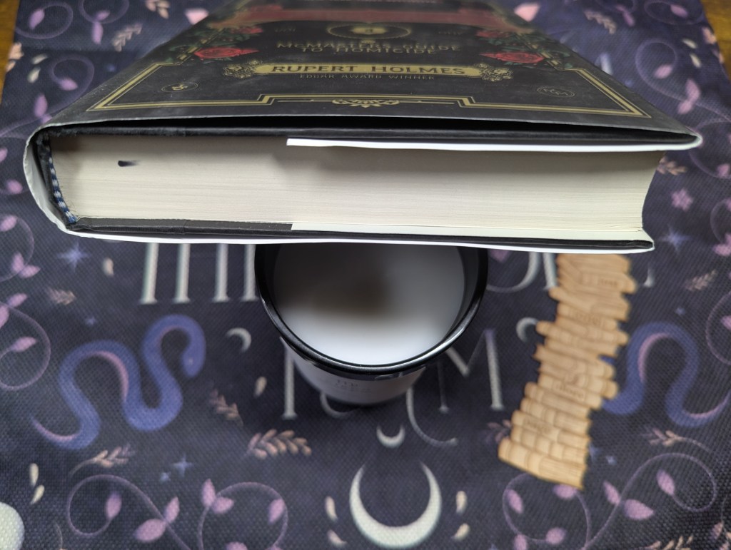 Image of the bottom of the book, showing the black dot